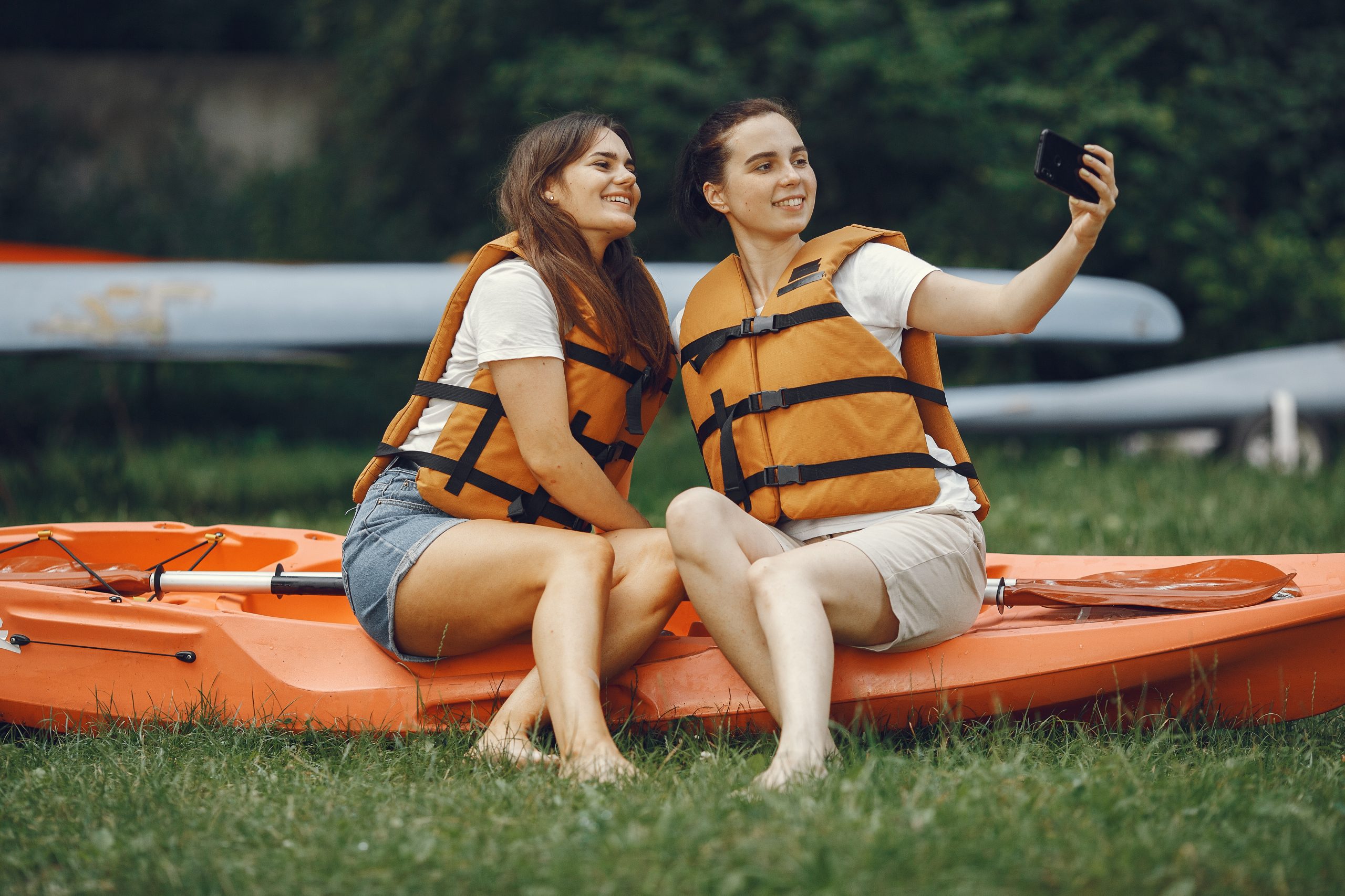 Women with safety jacket with kayak